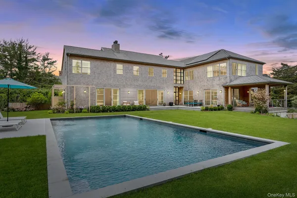 a view of a house with a swimming pool