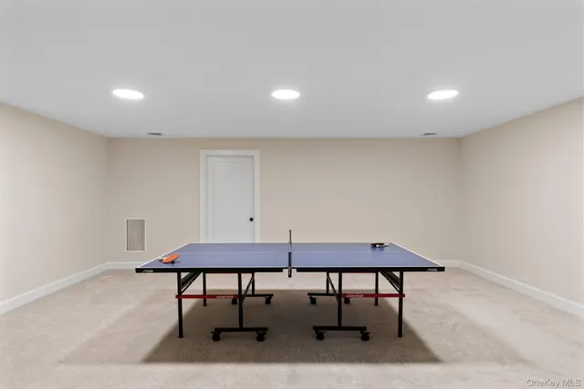 a room with furniture and a rug