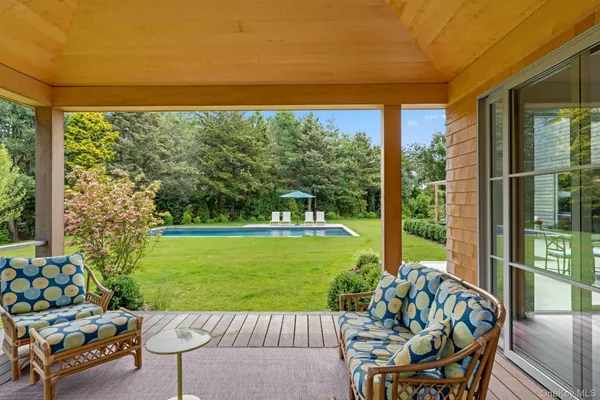 a view of a patio with garden view