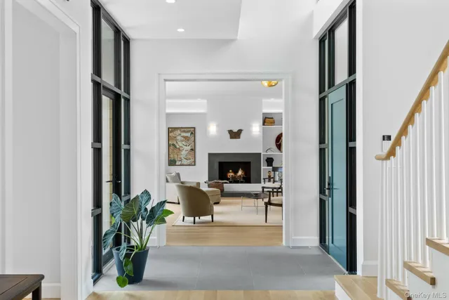 a view of a livingroom with furniture and a fireplace