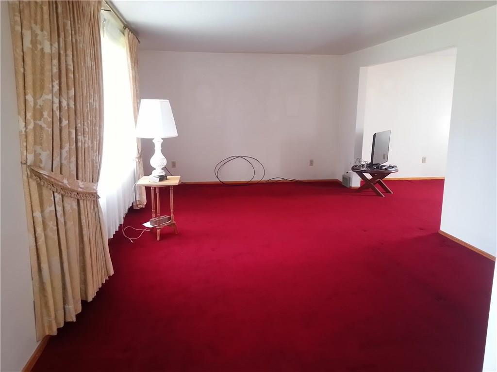 330 Middletown Road New Stanton, PA 15672 - Photo 11 of 23 Spacious Living Room with hardwood flooring under carpet!