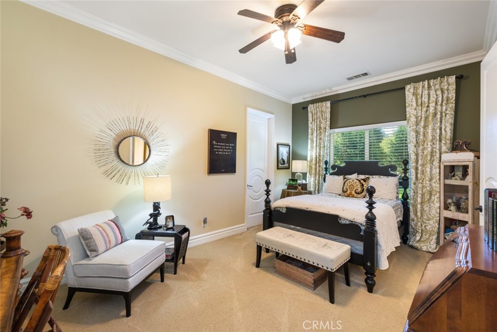 23965 Lawson Road Corona, CA 92883 - Photo 30 of 74 a living room with furniture and a large window