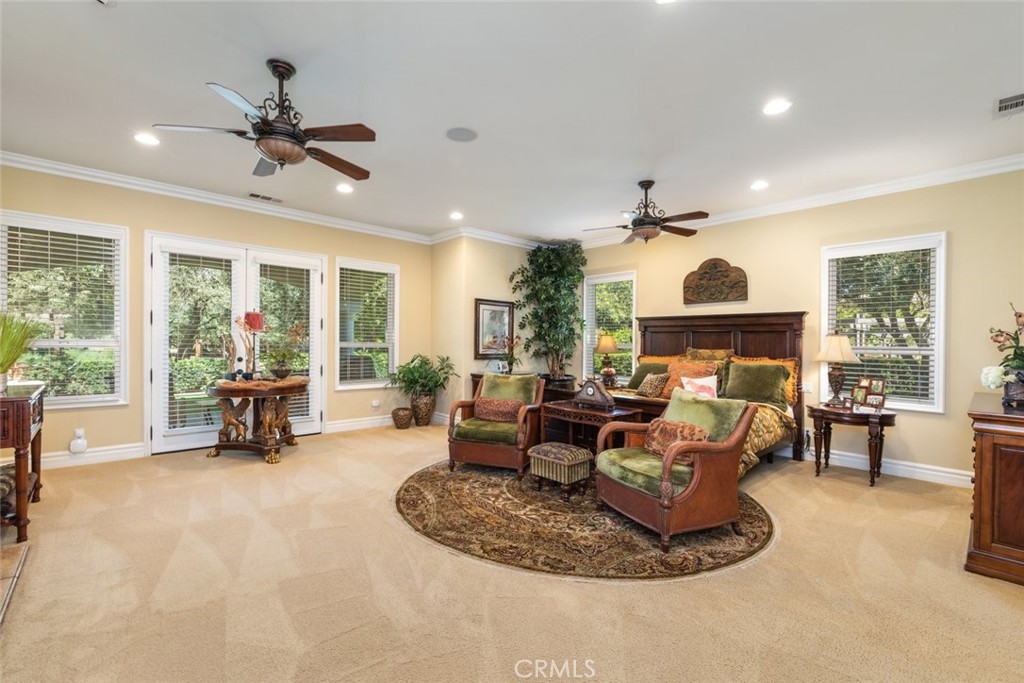 23965 Lawson Road Corona, CA 92883 - Photo 35 of 74 a living room with furniture large window and a fireplace