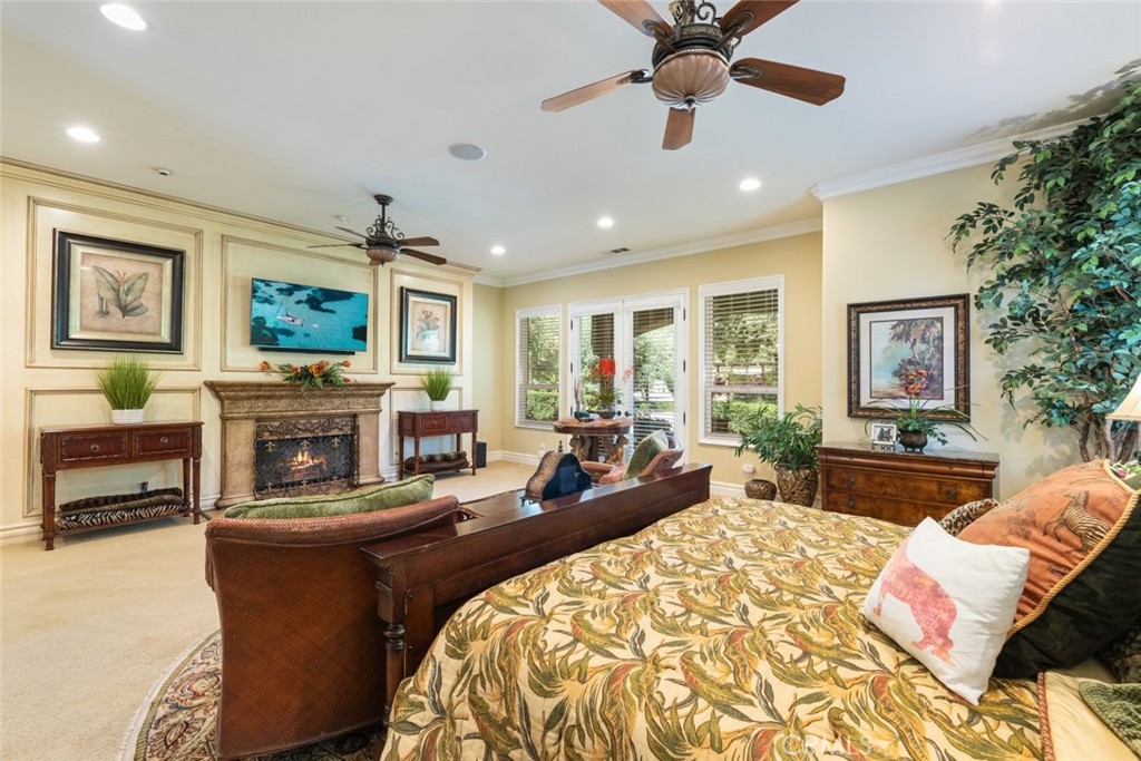 23965 Lawson Road Corona, CA 92883 - Photo 37 of 74 a living room with furniture and a flat screen tv