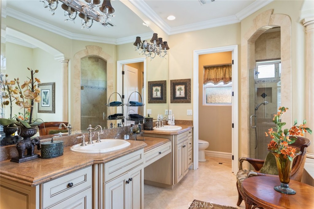 23965 Lawson Road Corona, CA 92883 - Photo 40 of 74 a bathroom with a sink double vanity granite and a mirror