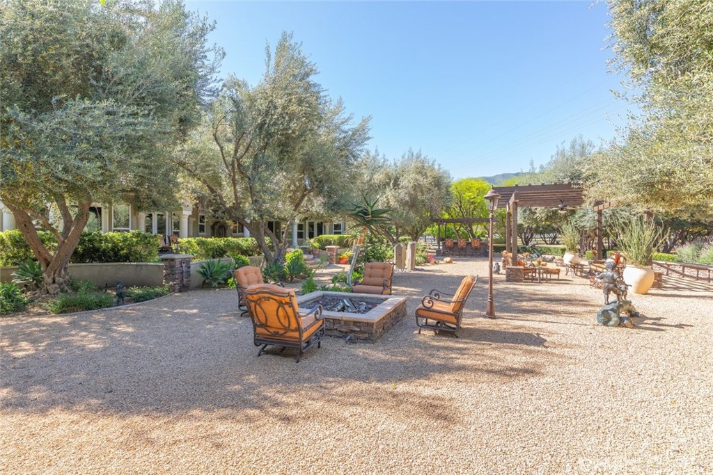 23965 Lawson Road Corona, CA 92883 - Photo 48 of 74 a view of a park with swings and slides