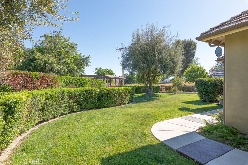 23965 Lawson Road Corona, CA 92883 - Photo 57 of 74 a view of a house with a yard