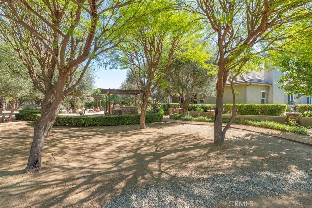 23965 Lawson Road Corona, CA 92883 - Photo 59 of 74 a view of a house with a tree in front of it