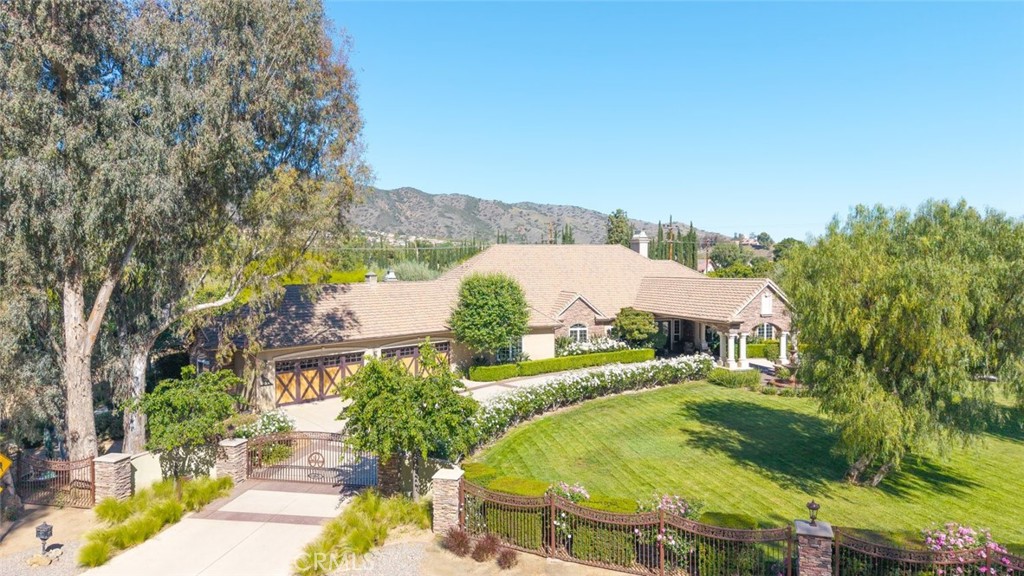 23965 Lawson Road Corona, CA 92883 - Photo 69 of 74 an aerial view of residential houses with outdoor space and trees