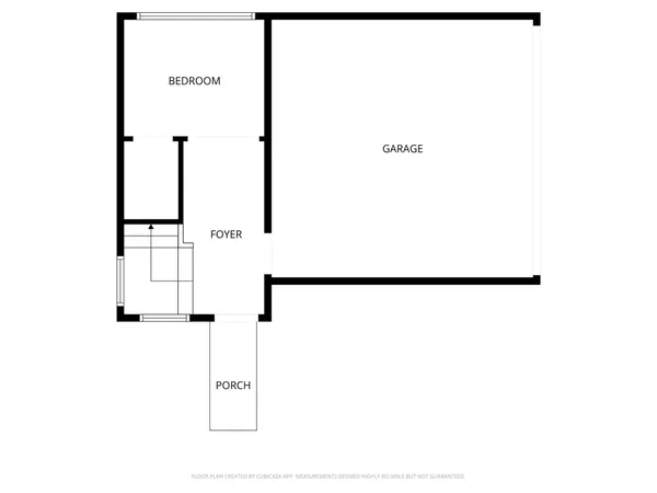 a front view of building with yard and green space