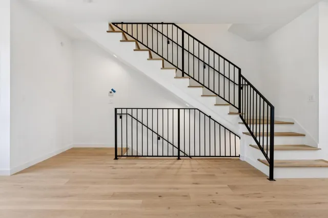 a view of entryway with wooden floor