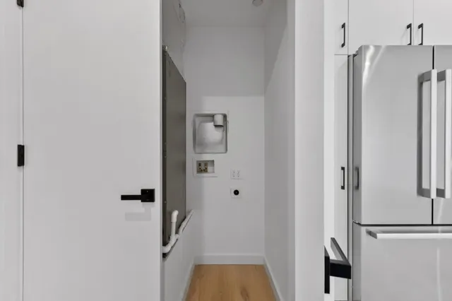 a view of bathroom with a tub and shower