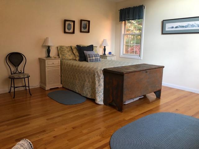 40 Amos Landing Road Mashpee, MA 02649 - Photo 15 of 28 a living room with a bed furniture and a window