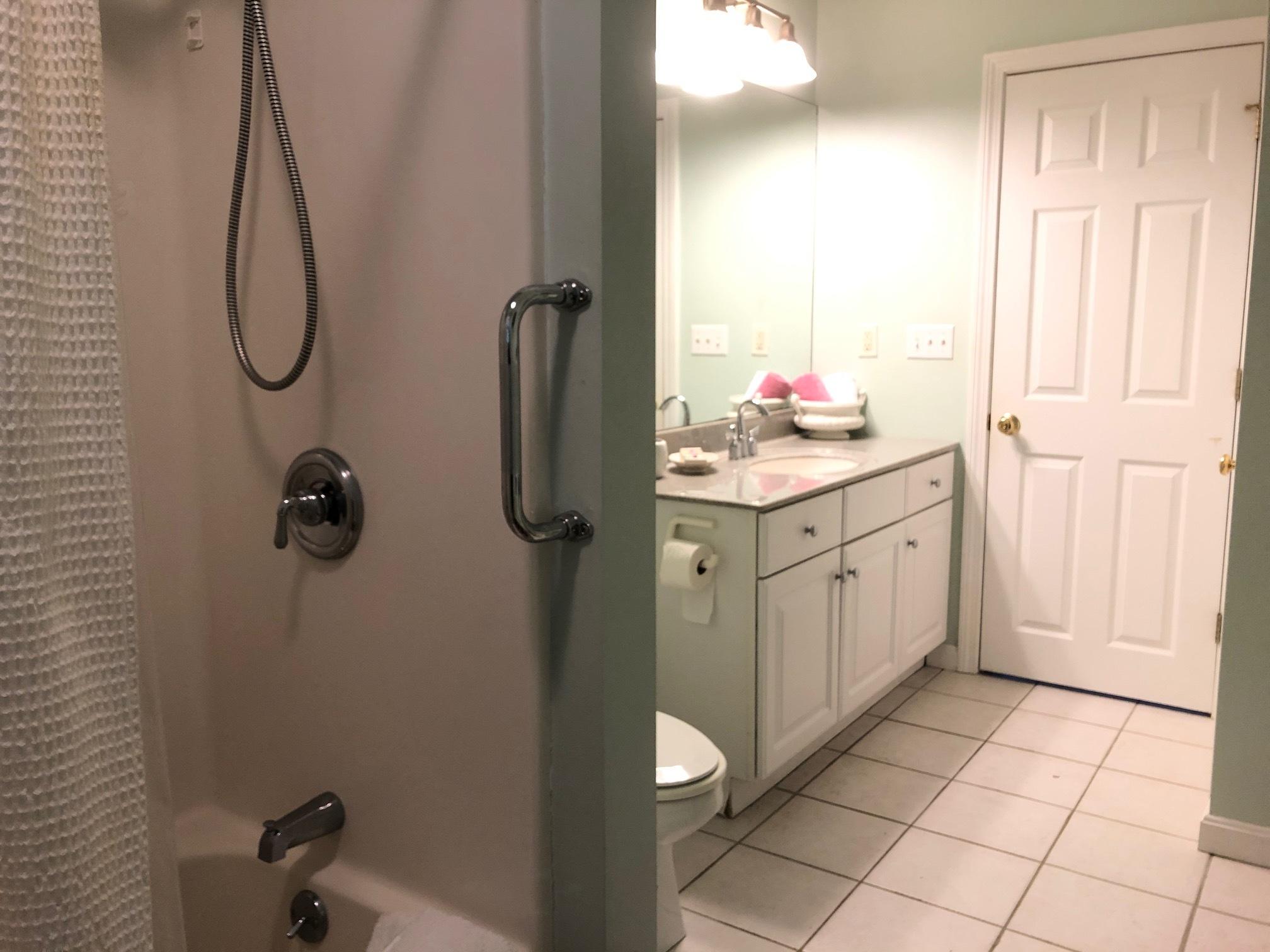 40 Amos Landing Road Mashpee, MA 02649 - Photo 17 of 28 a bathroom with a granite countertop sink a toilet and a mirror