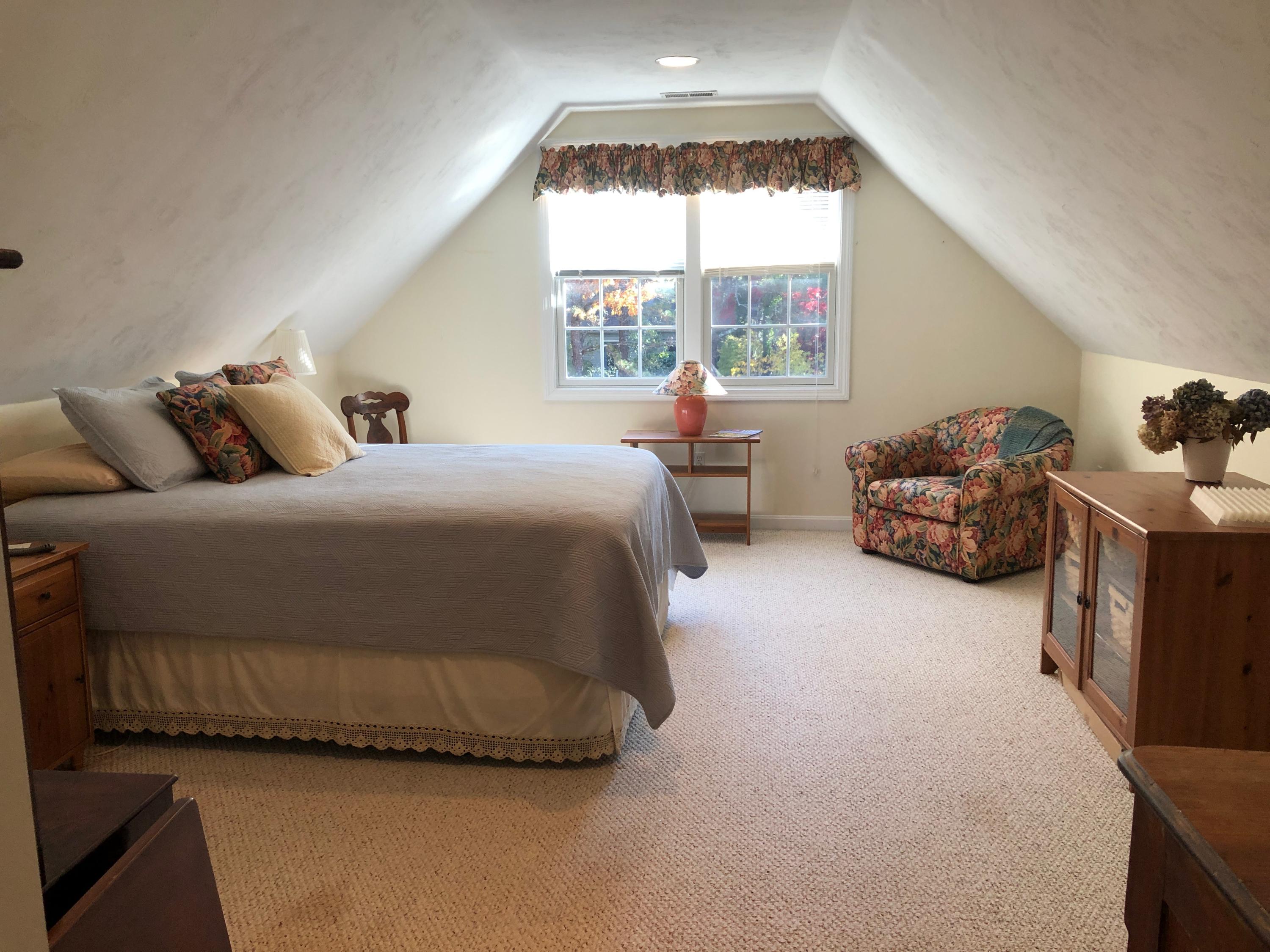 40 Amos Landing Road Mashpee, MA 02649 - Photo 19 of 28 a bedroom with a bed and a window