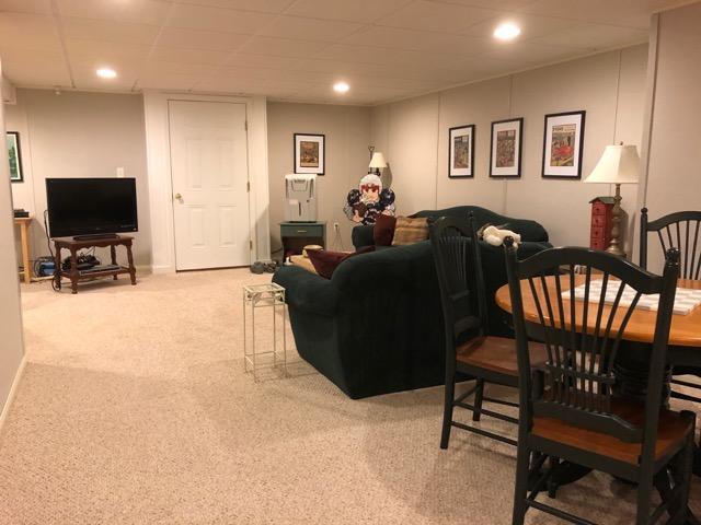 40 Amos Landing Road Mashpee, MA 02649 - Photo 22 of 28 a living room with furniture and a flat screen tv