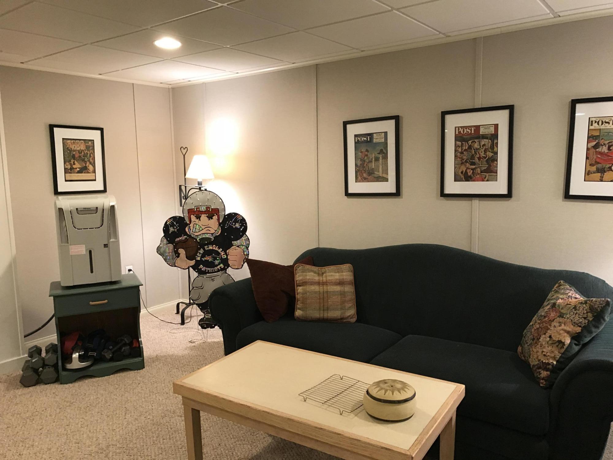 40 Amos Landing Road Mashpee, MA 02649 - Photo 23 of 28 a living room with furniture and a flat screen tv