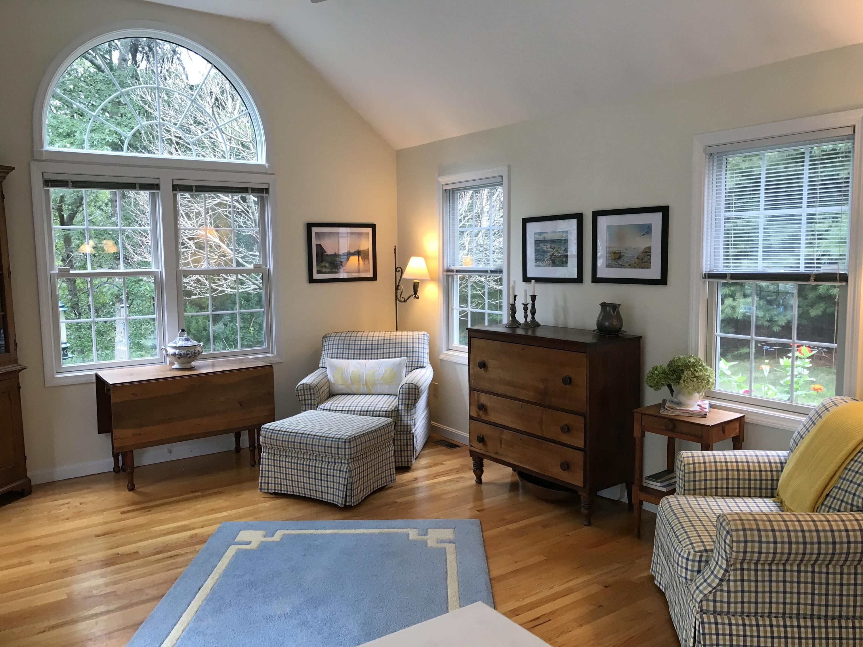 40 Amos Landing Road Mashpee, MA 02649 - Photo 6 of 28 a living room with furniture and a large window
