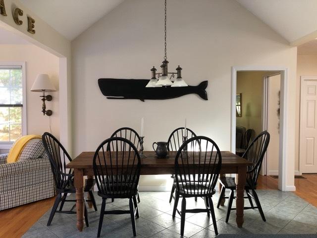 40 Amos Landing Road Mashpee, MA 02649 - Photo 7 of 28 a view of a dining room with furniture and chandelier