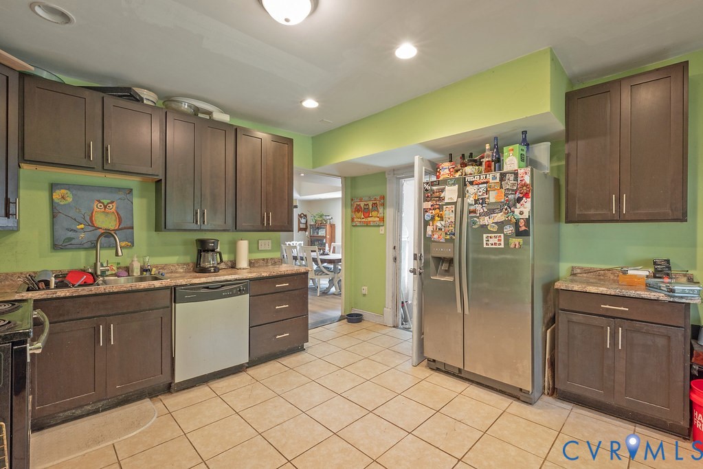 17033 North Telegraph Road Doswell, VA 23047 - Photo 7 of 12 a kitchen with a sink and cabinets