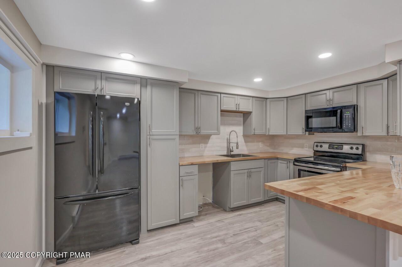 2128 Faratol Road East Stroudsburg, PA 18302 - Photo 11 of 85 a kitchen with a refrigerator sink and microwave