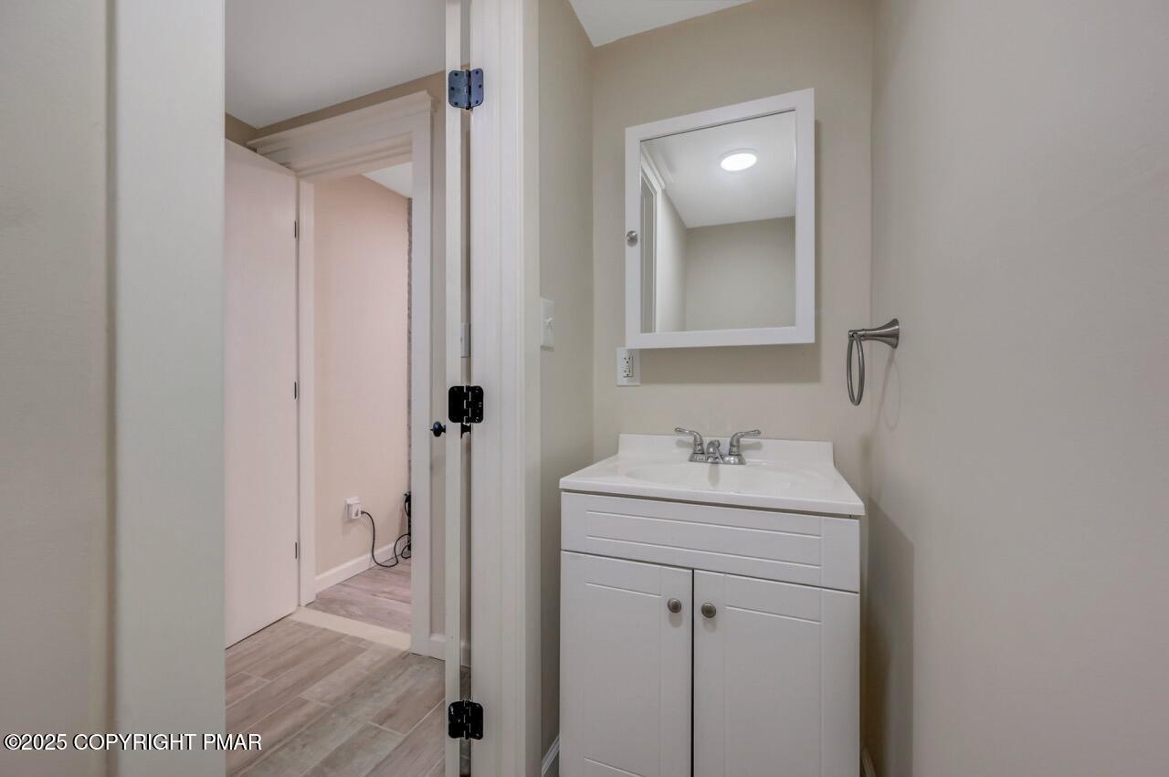 2128 Faratol Road East Stroudsburg, PA 18302 - Photo 24 of 85 a bathroom with a sink a toilet and shower