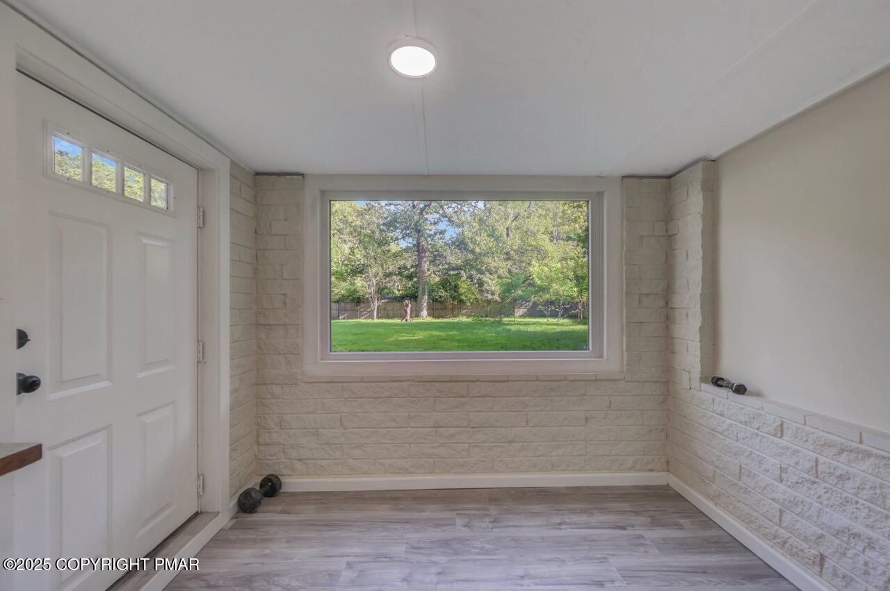 2128 Faratol Road East Stroudsburg, PA 18302 - Photo 27 of 85 a view of room with window and hardwood floor