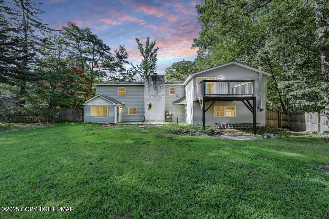 2128 Faratol Road East Stroudsburg, PA 18302 - Photo 4 of 85 a front view of a house with yard and green space