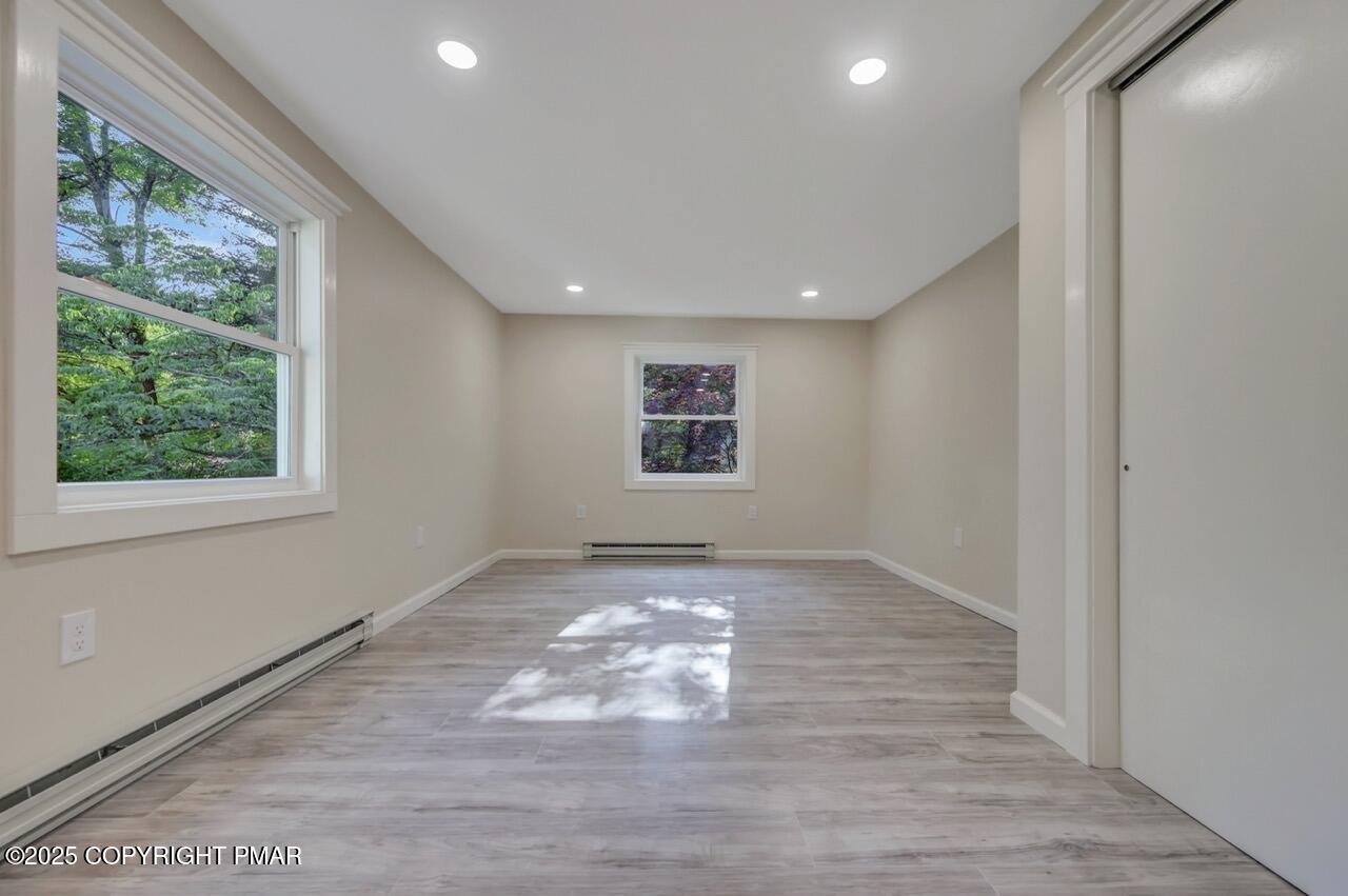 2128 Faratol Road East Stroudsburg, PA 18302 - Photo 43 of 85 a view of an empty room and glass door