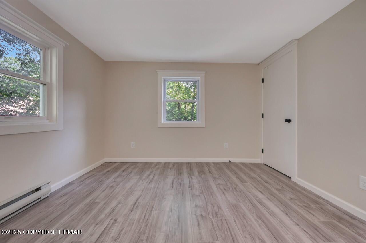 2128 Faratol Road East Stroudsburg, PA 18302 - Photo 78 of 85 a view of room with window and hardwood floor
