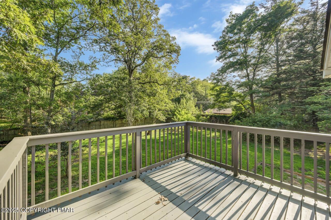 2128 Faratol Road East Stroudsburg, PA 18302 - Photo 80 of 85 a view of balcony with wooden floor and fence