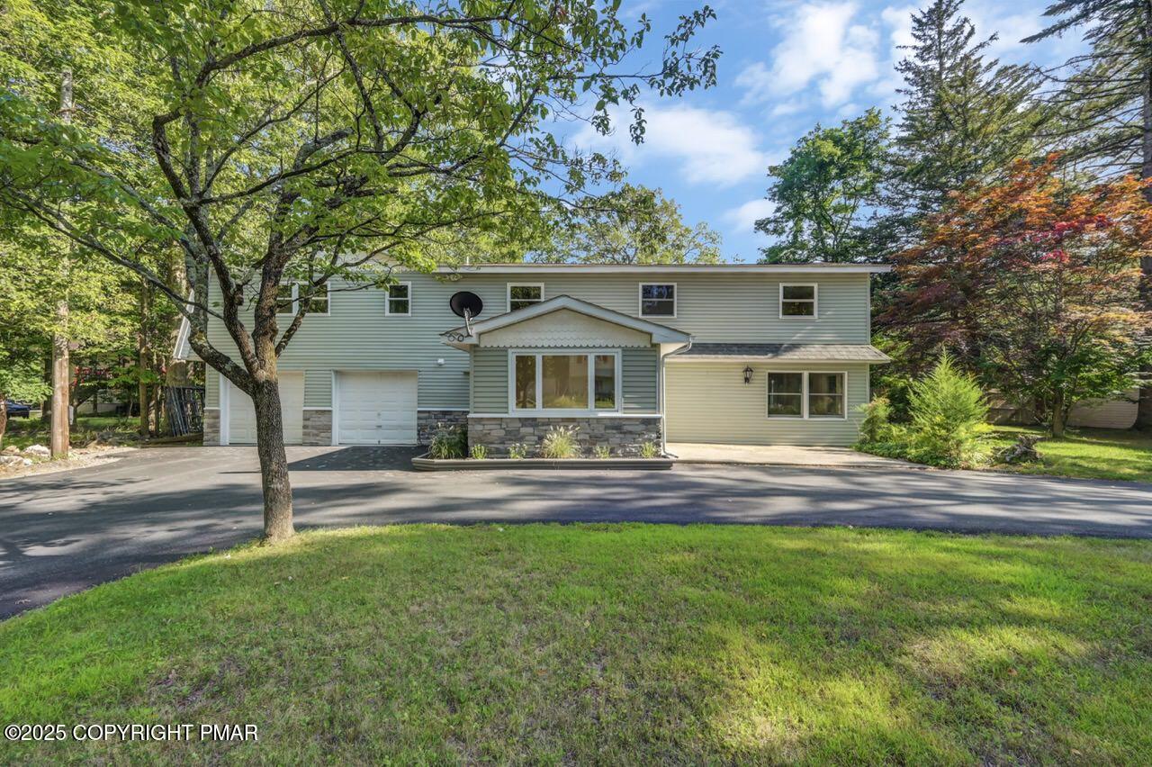 2128 Faratol Road East Stroudsburg, PA 18302 - Photo 82 of 85 front view of a house with a yard