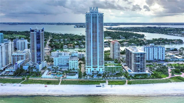 a bathroom with a toilet a sink and bathtub