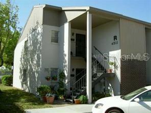 4511 South Oak Drive, Unit R12 Tampa, FL 33611 - Photo 1 of 1 a view of backyard of a house