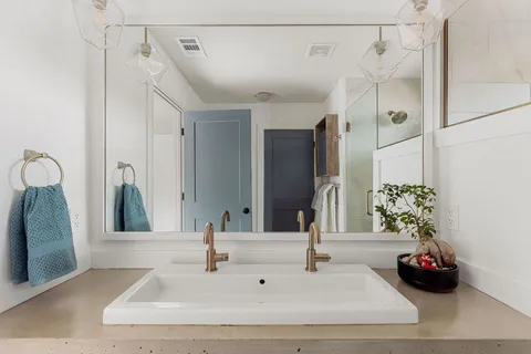 a living room filled with furniture and furniture