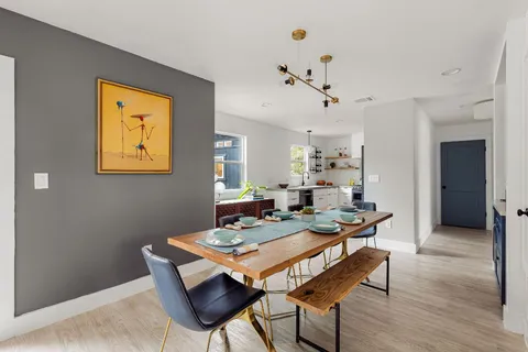 a view of a dining room with furniture