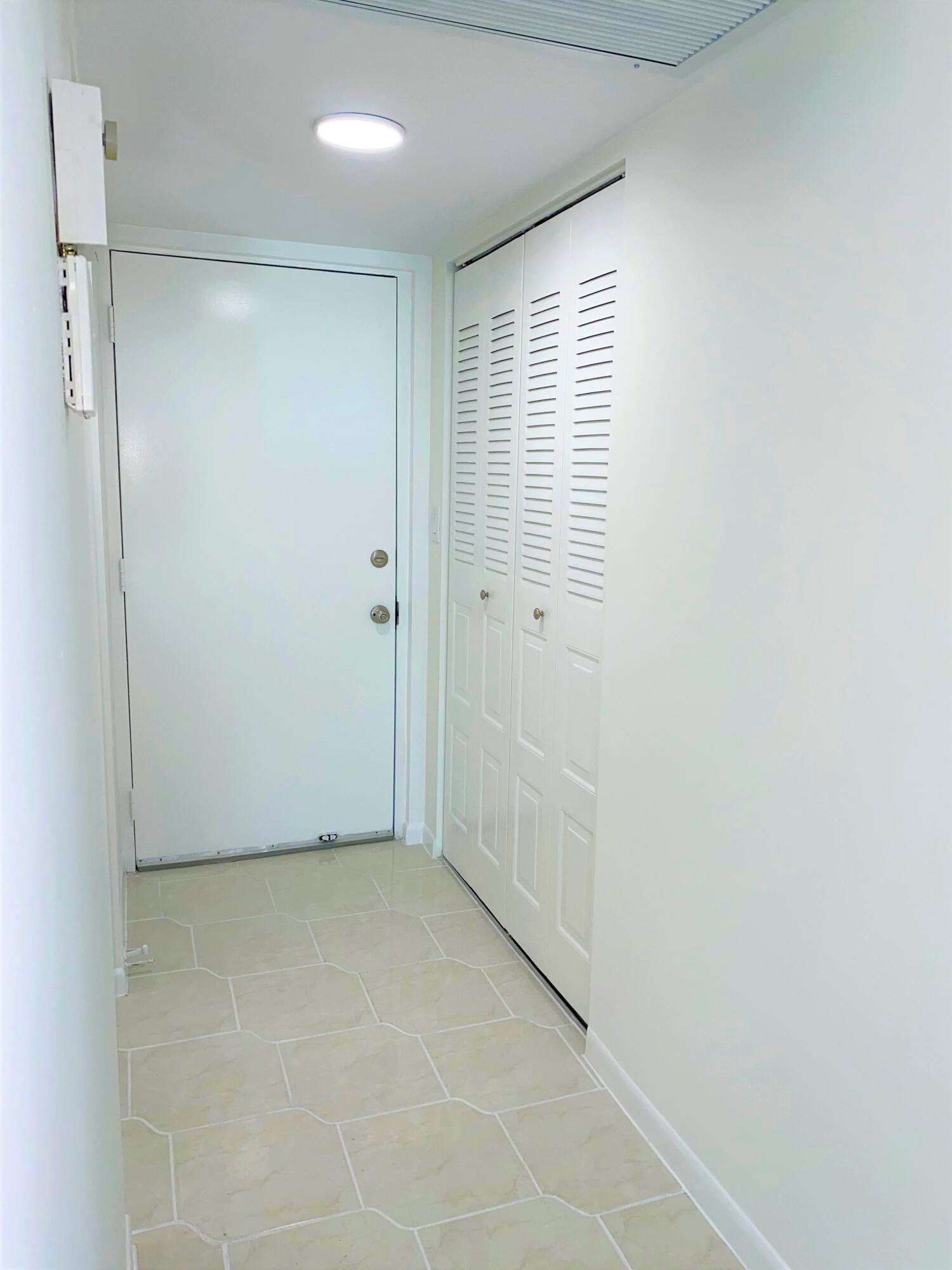 9233 Southwest 8th Street, Unit 305 Boca Raton, FL 33428 - Photo 31 of 48 Entrance Closet & Foyer