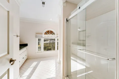 a view of bedroom with furniture and window