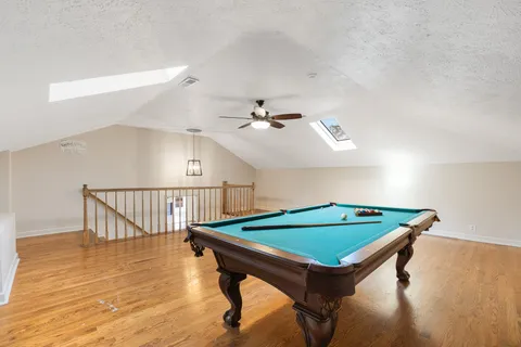a view of a house with a yard porch and sitting area