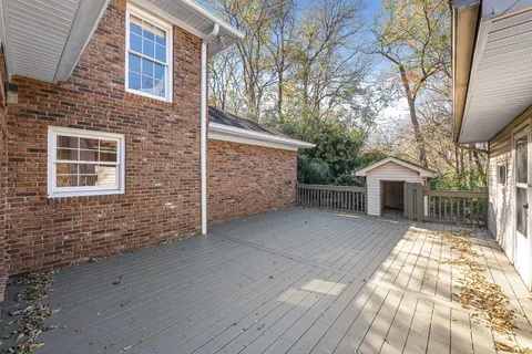 a view of a garage with wooden walls
