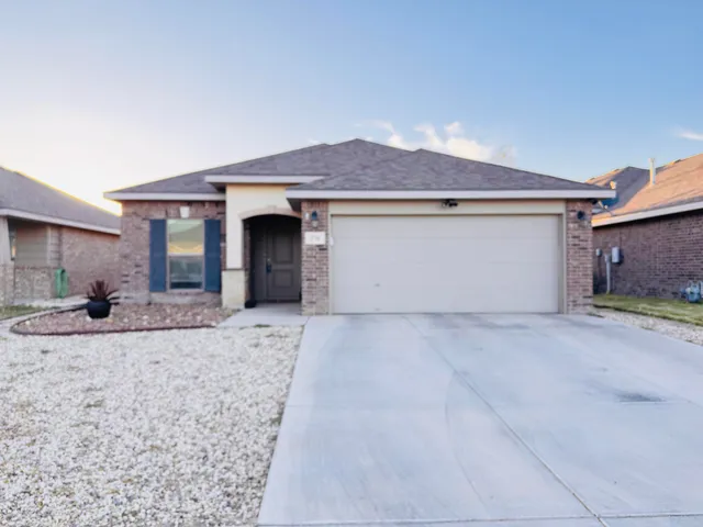 a front view of house with yard
