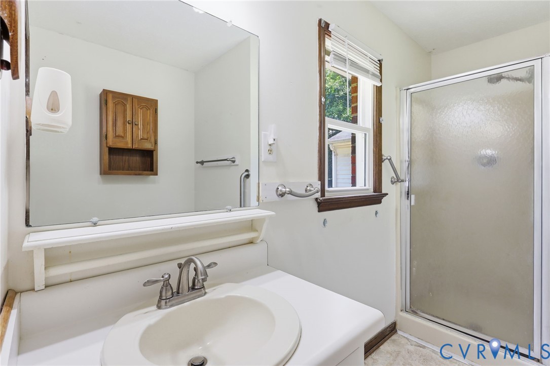 10111 Tunstall Road New Kent, VA 23124 - Photo 33 of 52 Bathroom featuring a glass-enclosed shower, single