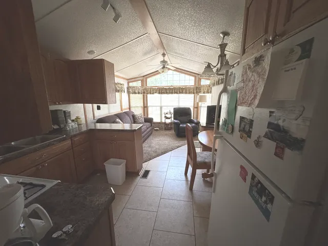 a kitchen with granite countertop lots of counter top space