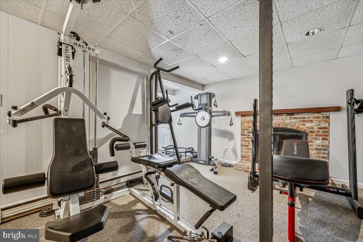 13120 Brandon Way Road Gaithersburg, MD 20878 - Photo 63 of 82 rec room with fireplace