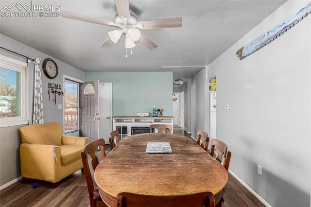 a view of a dining room with furniture