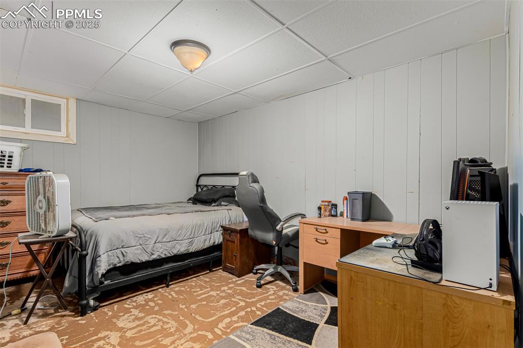 342 Mt View Lane Fountain, CO 80817 - Photo 10 of 17 a bedroom with a bed and wooden floor
