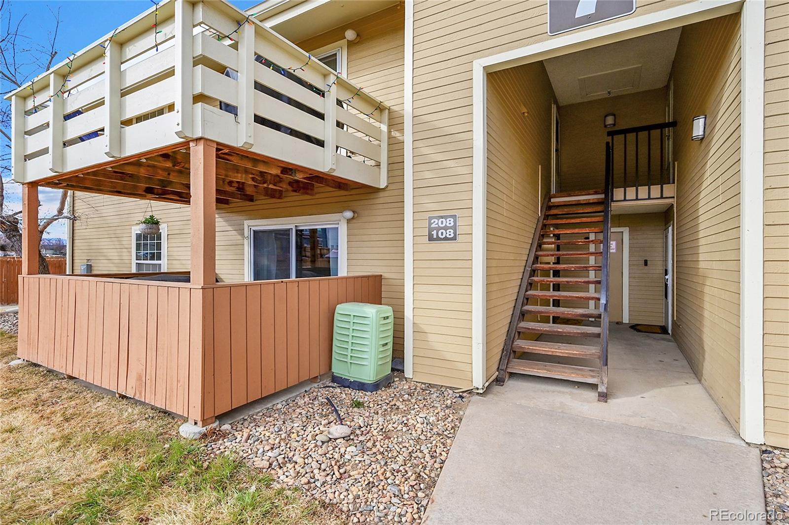 10251 West 44th Avenue, Unit 7108 Wheat Ridge, CO 80033 - Photo 2 of 21 front view of a house