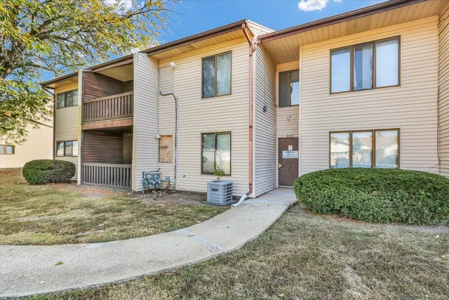 a view of a hallway with staircase