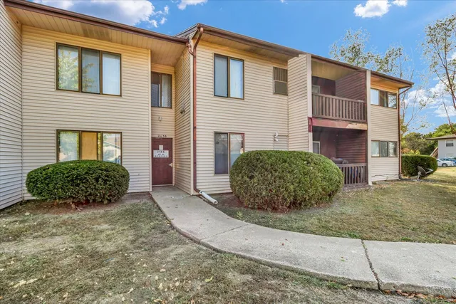a view of hallway with cabinets