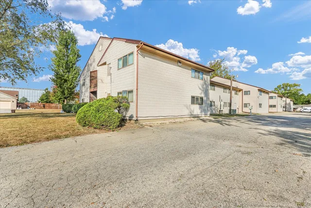 an empty room with closet area